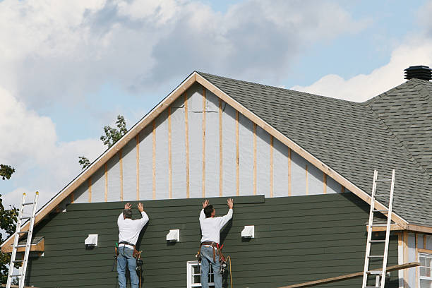 Professional Siding Installation technician working in Hinckley, OH